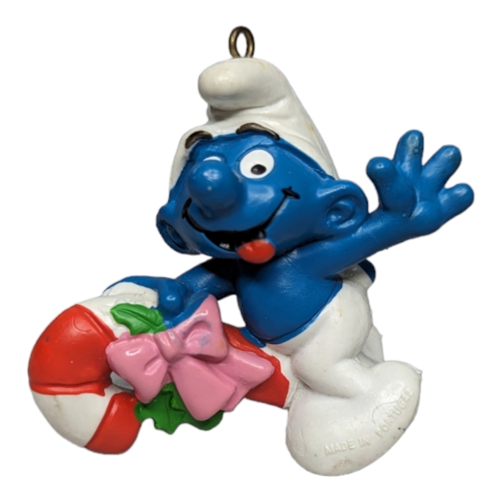 Vintage 80s Smurf Riding a Candy Cane Ornament